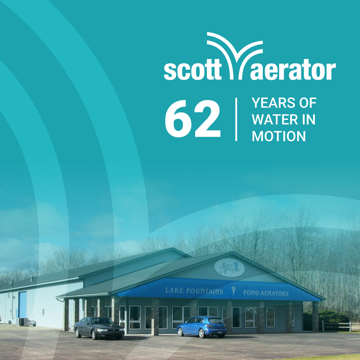 Scott Aerator building with blue sky and cars in front, featuring the Scott Aerator logo and text.
