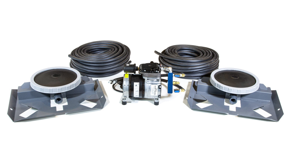 Compact pneumatic Bubble Pro 2 kit with two round pads, air pump, and hoses on white.