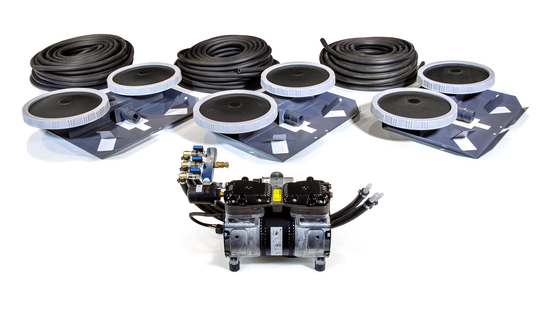 Mechanical components including belts and a motor on a white background