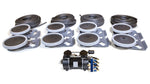Collection of mechanical components including belts and pulleys on a white background